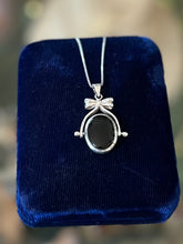 Load image into Gallery viewer, Vintage Sterling Silver Black Onyx and Mother of Pearl Double Sided Spinner Bow Motif Pendant Necklace 18”