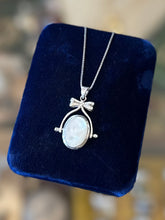 Load image into Gallery viewer, Vintage Sterling Silver Black Onyx and Mother of Pearl Double Sided Spinner Bow Motif Pendant Necklace 18”