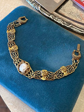 Load image into Gallery viewer, Vintage Midcentury Gold Tone & Resin Cameo Panel Link Bracelet 7"