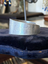 Load image into Gallery viewer, Vintage WWII Era 1940s US Military Trench Art Handmade Aluminum Sweetheart Cuff Bracelet Bremerhaven Germany “My Darling”