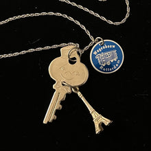 Load image into Gallery viewer, “KEY TO THE CITY” Handmade Charm Cluster Necklace Vintage American Tourister Key Advertising Tag & Eiffel Tower Charm