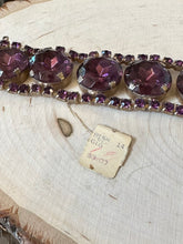 Load image into Gallery viewer, Vintage 1950s DEADSTOCK Unsigned Chunky Glass Rhinestone Purple Statement Bracelet with Fields Store NYC Tag
