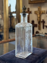 Load image into Gallery viewer, Antique 1910s Edwardian Clear Glass Holy Water Bottle Cross &amp; Leaves with Metal Crown Cap 6” Tall
