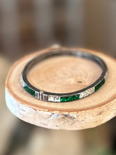 Load image into Gallery viewer, Art Deco Sterling Silver Emerald Green &amp; Clear Square Faceted Rhinestone Engraved Hinged Bangle Bracelet
