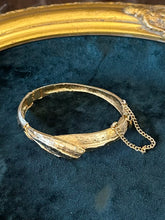 Load image into Gallery viewer, Vintage Midcentury Textured Gold Tone Wave Motif Hinged Bangle Bracelet Unsigned
