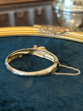 Load image into Gallery viewer, Vintage Midcentury Textured Gold Tone Wave Motif Hinged Bangle Bracelet Unsigned
