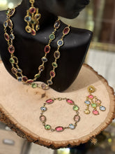 Load image into Gallery viewer, Vintage 3Pc Set Faceted Multicolor Oval and Circle Crystal Bezel Gold Tone Necklace, Bracelet, &amp; Multi-strand Dangle Earrings
