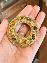 Load image into Gallery viewer, Vintage Midcentury Matte Gold Tone Orange &amp; Brown Faceted Rhinestone Wreath Circle Brooch
