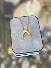 Load image into Gallery viewer, Vintage TRIFARI Gold Tone Charm Amulet Holder Pendant Necklace 30.25”

