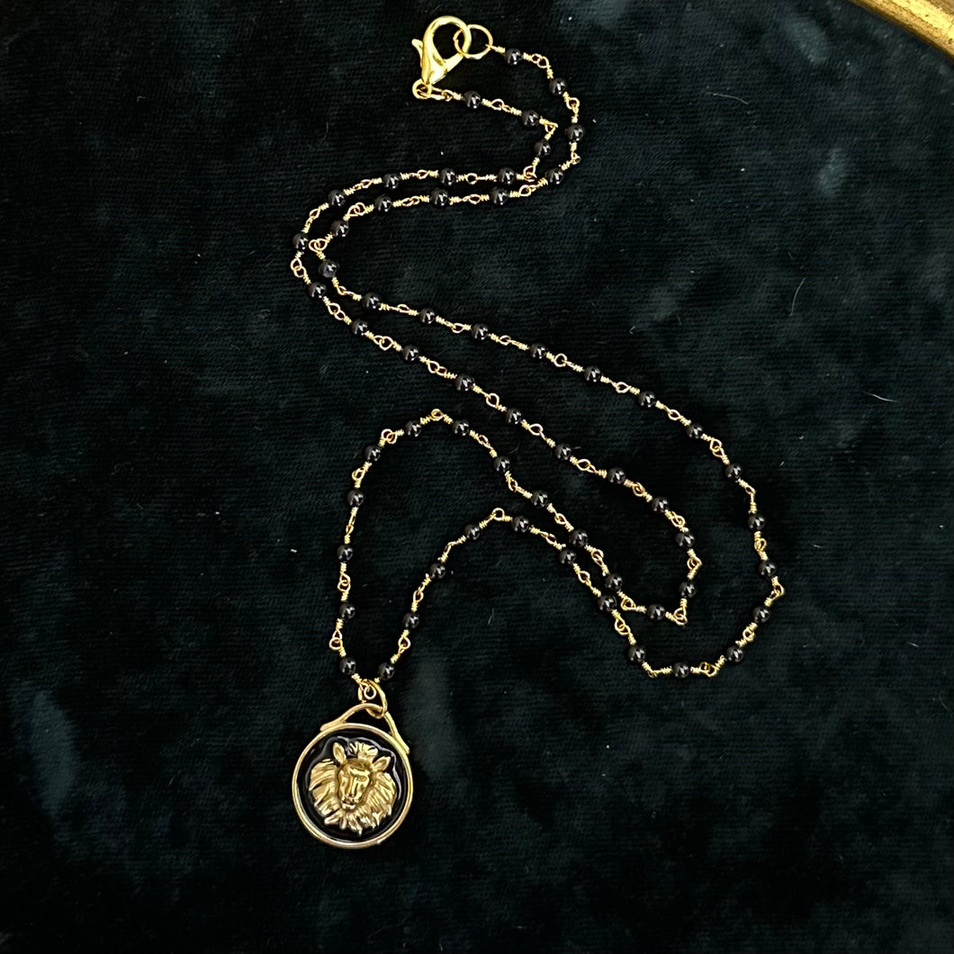‘LEO RISING’ Black & Gold Tone Beaded Lion Pendant Necklace