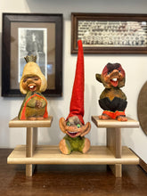 Load image into Gallery viewer, Vintage 1960s Henning Norway Signed Scandinavian Hand Carved Hand Painted Set of 3 Wooden Trolls with Wood Display Stand
