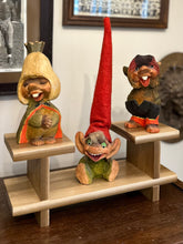 Load image into Gallery viewer, Vintage 1960s Henning Norway Signed Scandinavian Hand Carved Hand Painted Set of 3 Wooden Trolls with Wood Display Stand
