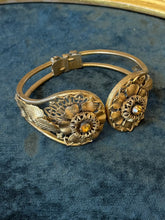 Load image into Gallery viewer, Vintage 1940s Brass Tone Floral Clamper Bracelet Faceted Amber Rhinestones
