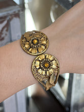 Load image into Gallery viewer, Vintage 1940s Brass Tone Floral Clamper Bracelet Faceted Amber Rhinestones
