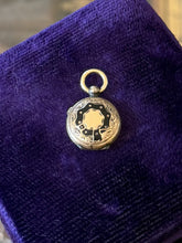 Load image into Gallery viewer, Antique Victorian Era Gold Filled &amp; Black Enamel Floral Petite Locket Pendant
